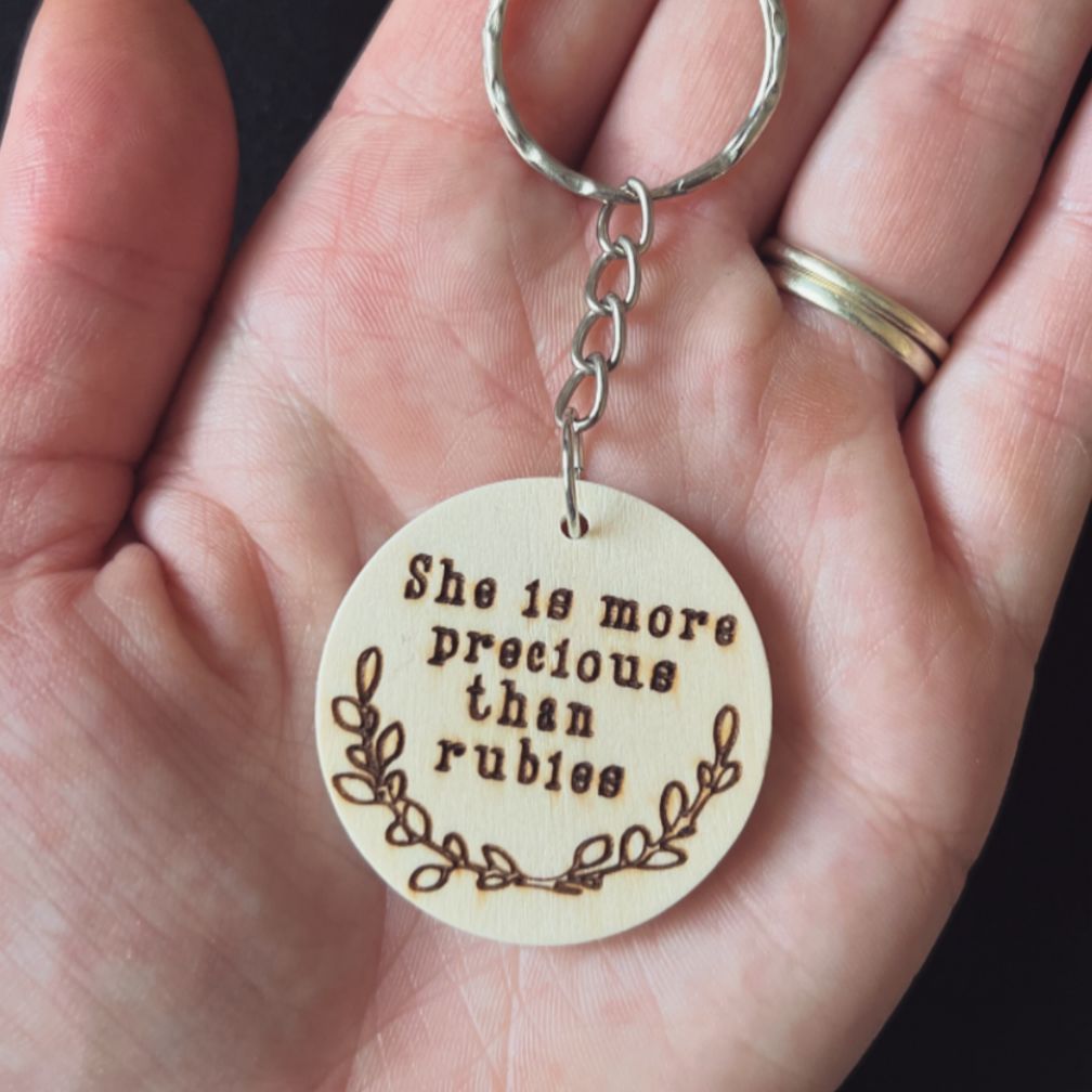 'She is more precious than rubies' wooden keyring