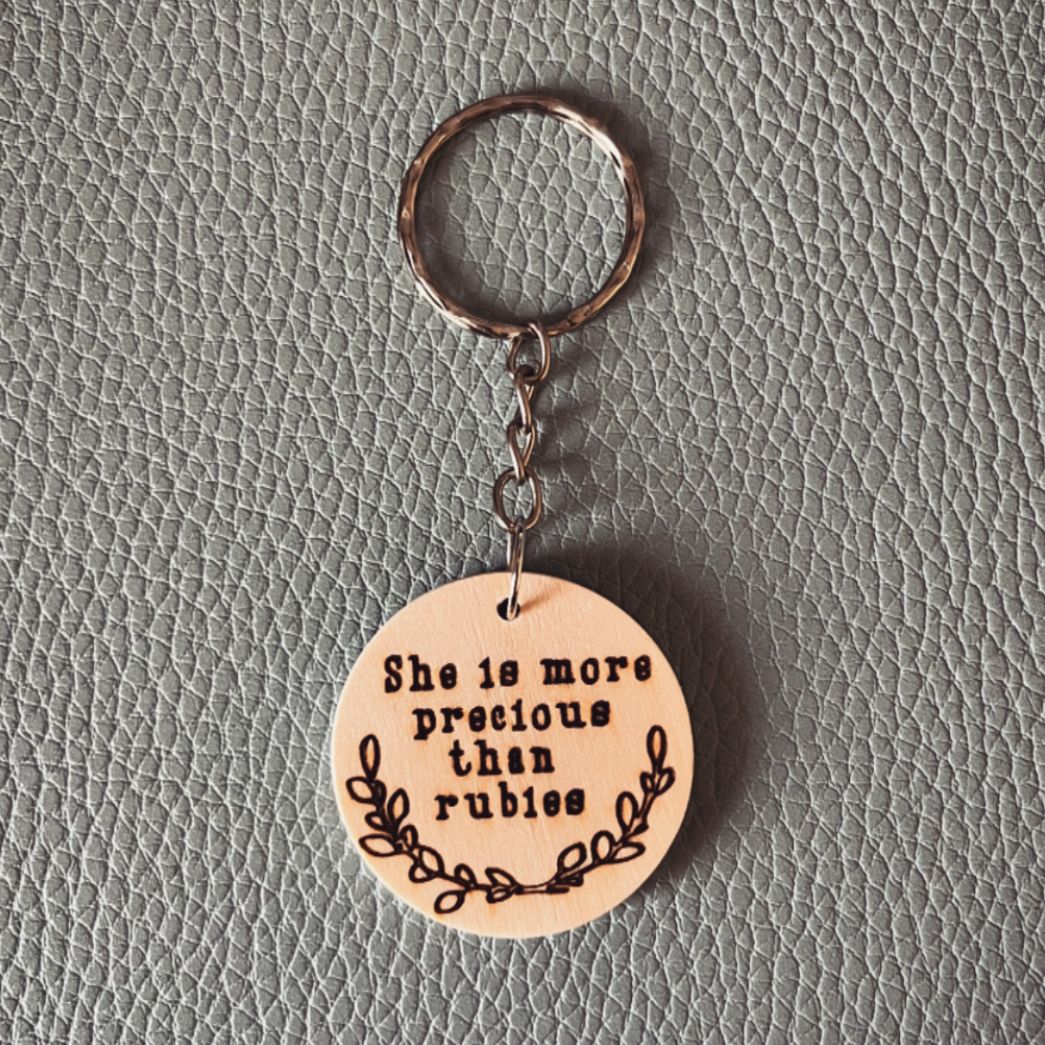 'She is more precious than rubies' wooden keyring