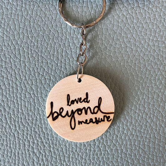 'Loved beyond measure' wooden keyring