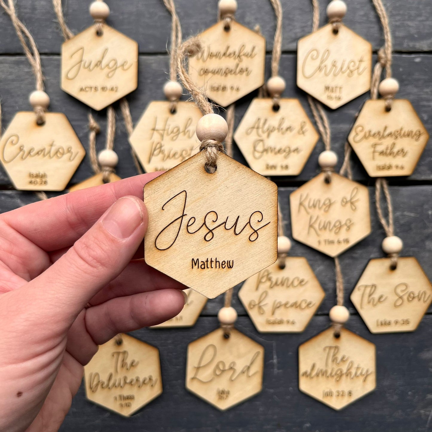 'Names of Christ advent baubles' - set of 25 wooden baubles