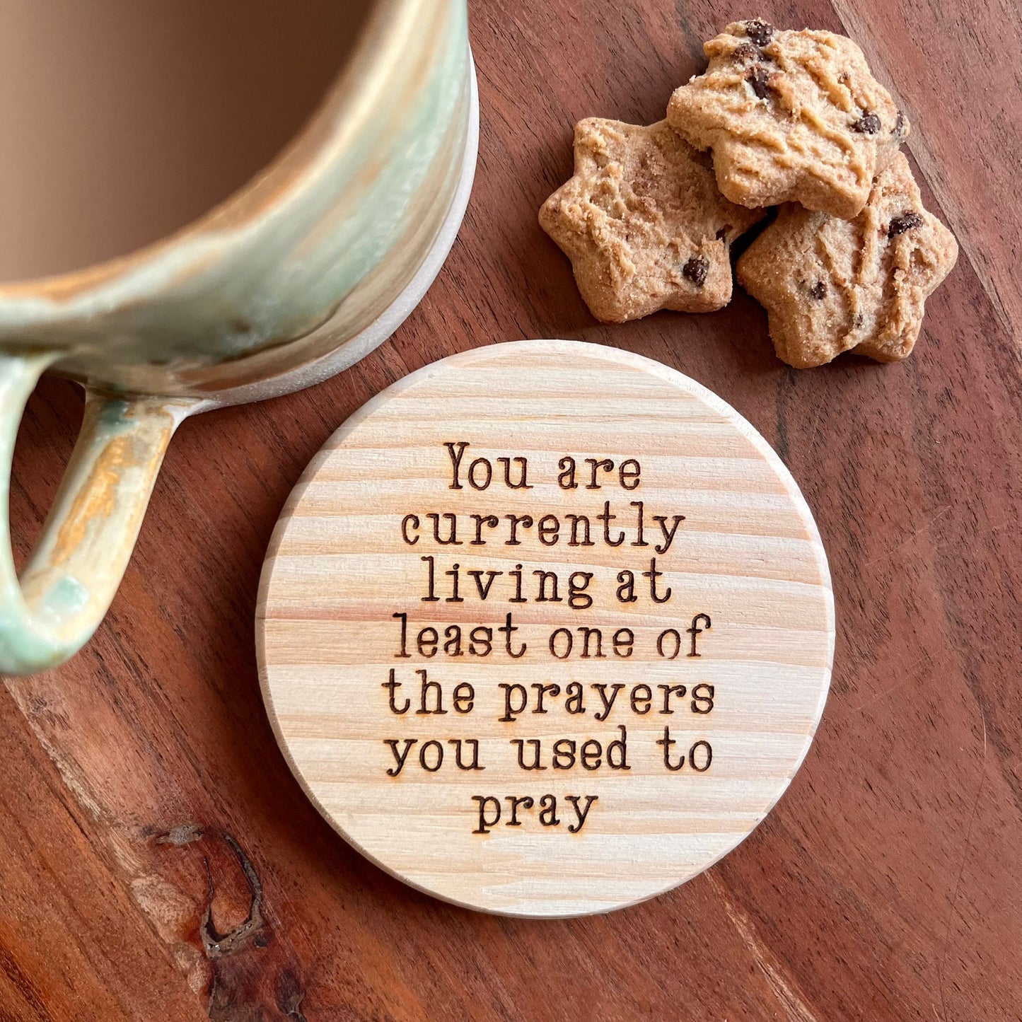 'Living your prayers' wooden coaster