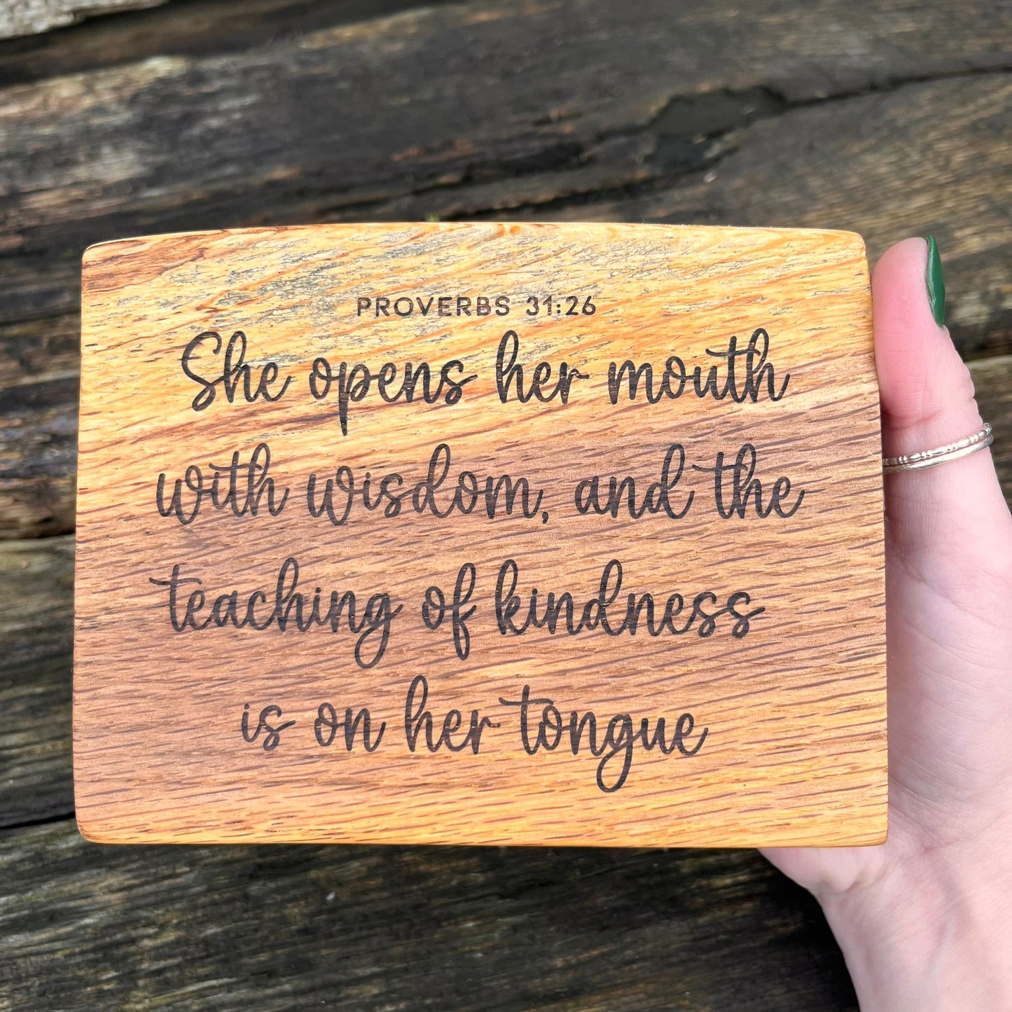 'Kindness is on her tongue' - solid wood decorative plaque