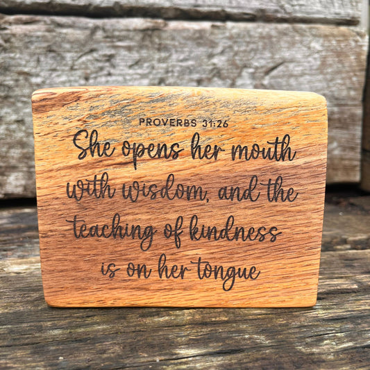 'Kindness is on her tongue' - solid wood decorative plaque