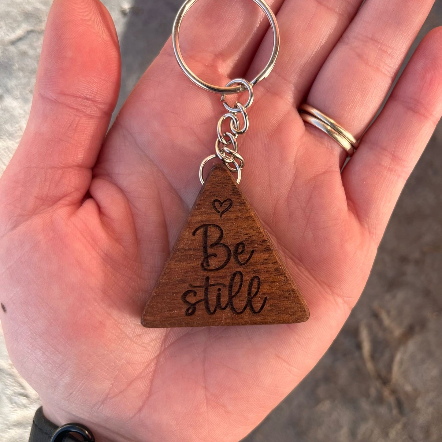 'Be still' solid walnut keyring